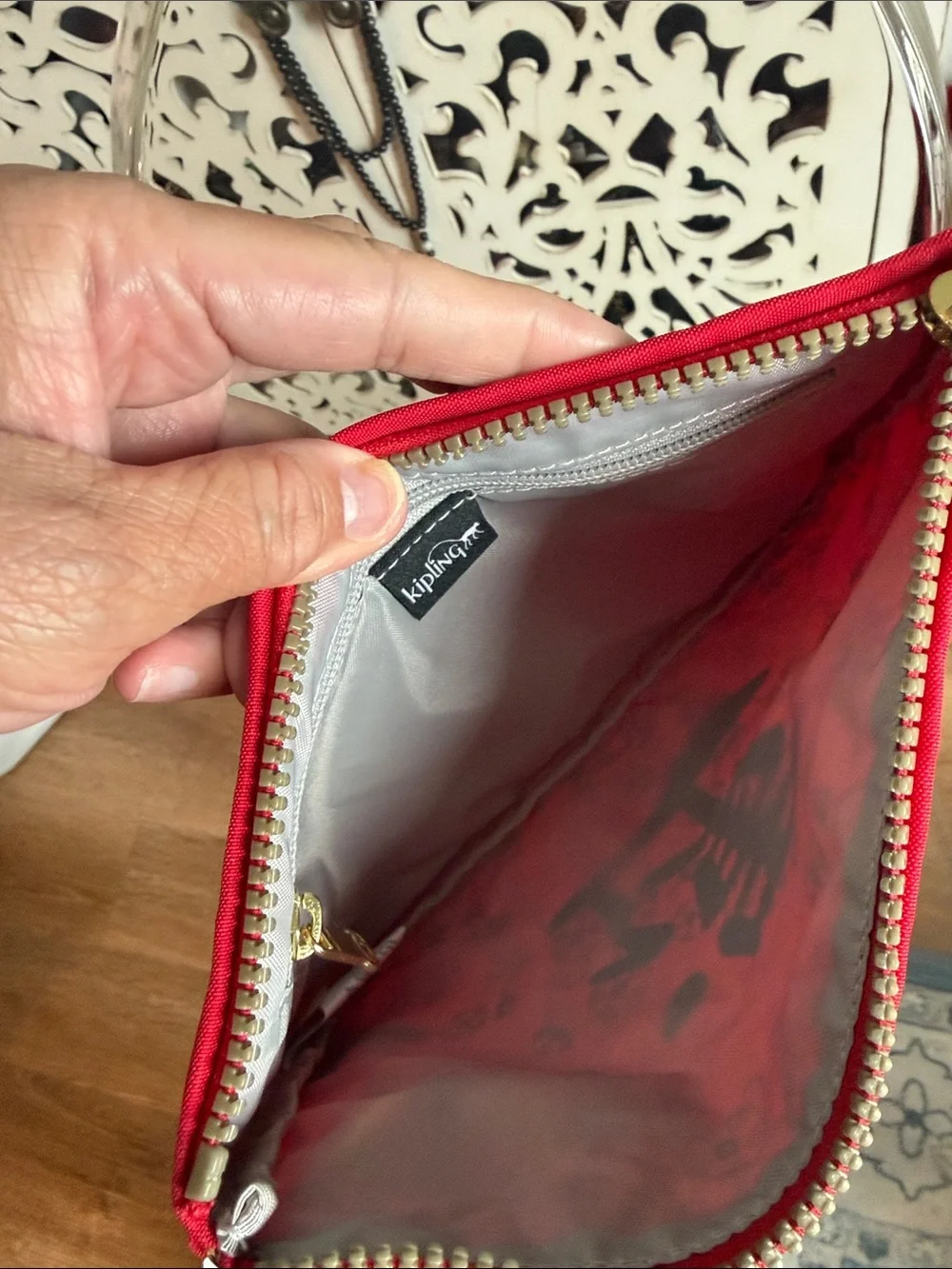 Kipling Red and Gold Floral Wristlet Clutch with Black Calligraphy